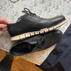 Size 9 men’s Cole Haan black dress shoes. Never been worn.